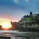 Family Bali Tour Package - Tropical paradise beach sunset with traditional boats